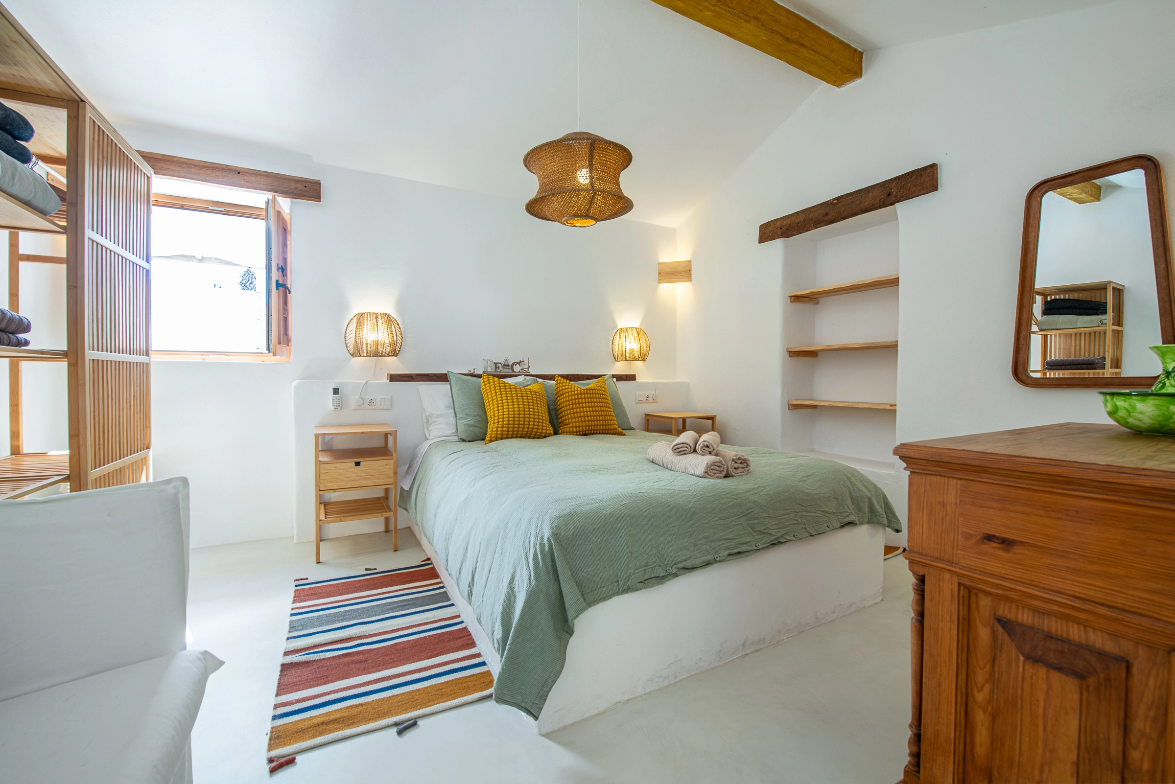 bright bedroom with green accents at Azuro Stays Alcalá Tenerife